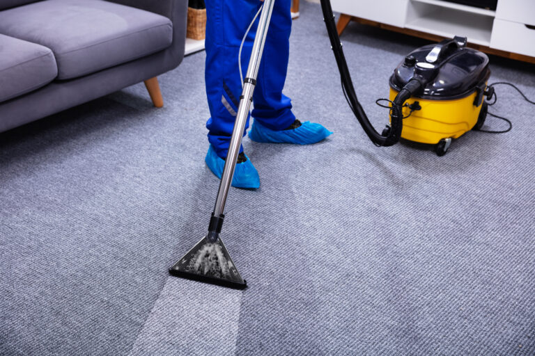 Professional carpet cleaning with extraction machine